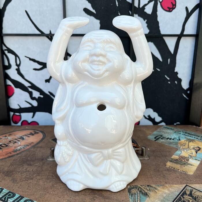 Rhino traveled back in time and found this lovely relic from Orchids of Hawaii. This White Buddha Tiki Mug was made in Taiwan and has a large opening in the back for pouring drinks and a small hole in the front for a straw! This mug is in great condition with no chips or cracks! Perfect for your home Tiki Bar or next cocktail party! He can't wait to come home with you 🍹 Shop Rhino and Lucy Tiki Mugs