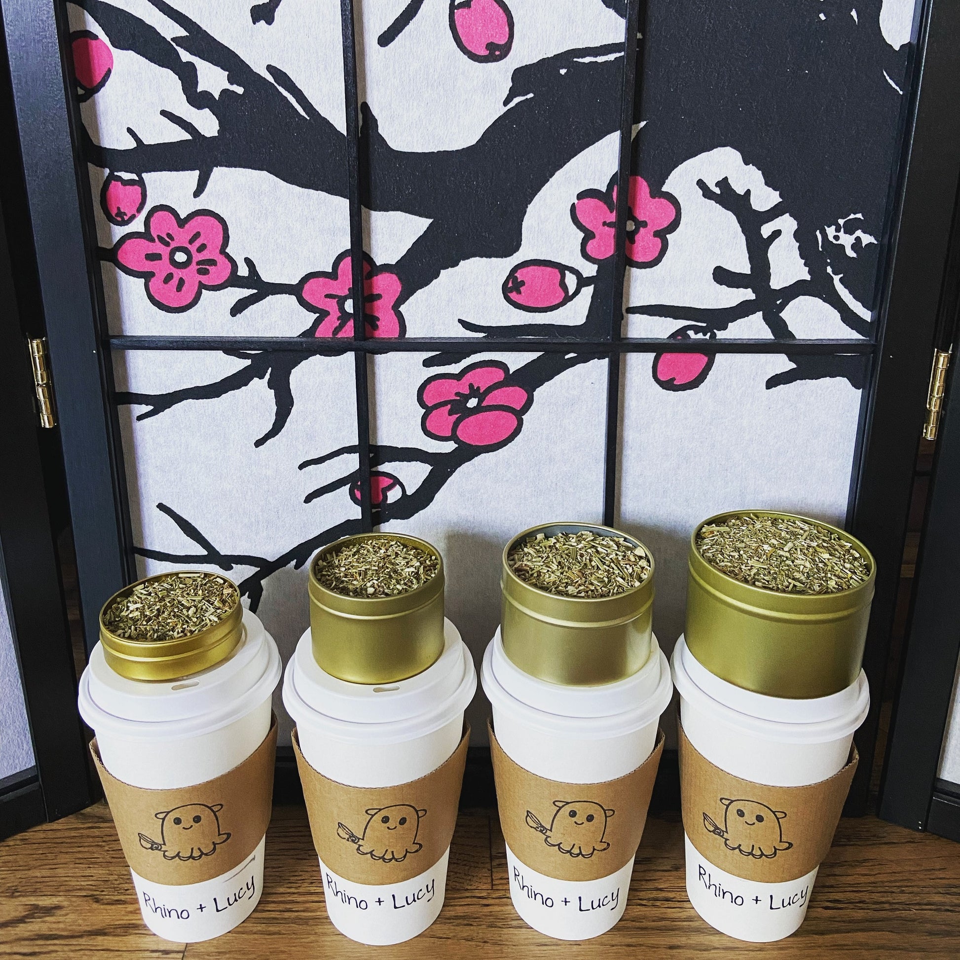 Shop Rhino and Lucy Custom Teas! Gold gift tin sizes. Sample 10 tsp, Small 20 tsp, Medium 30 tsp, Large 45 tsp