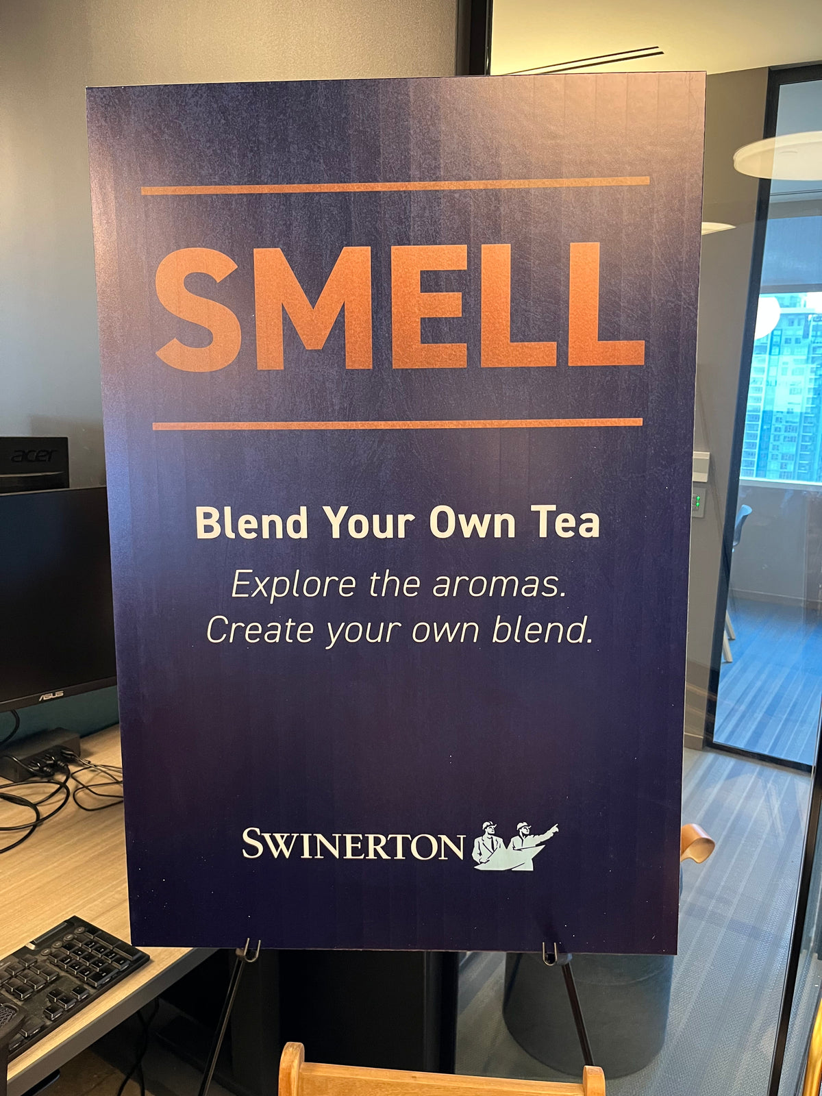 Custom branded event signage for the Rhino and Lucy tea blending station at a client appreciation party.